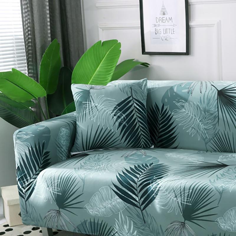 Stretch-Kissenbezüge 45 × 45 cm — 2er-Set, Grün Palmen, auf einem Sofa