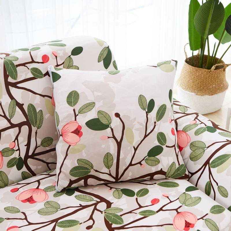 Stretch-Kissenbezug 45 × 45 cm — 1 Stück, Ecru mit rosa Blumenmuster, auf einem Sofa