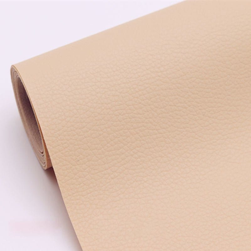 Selbstklebender Reparatur-Patch für Leder und Kunstleder, Farbe Beige: selbstklebender Patch auf der Rolle mit Ledernarbung